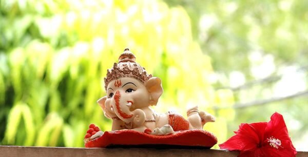 Beckon Venture-Handicrafted Sleeping Lord Ganesha Statue-Red